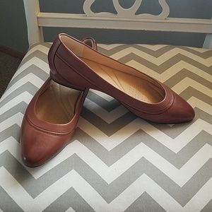 Brown leather Clark flats
